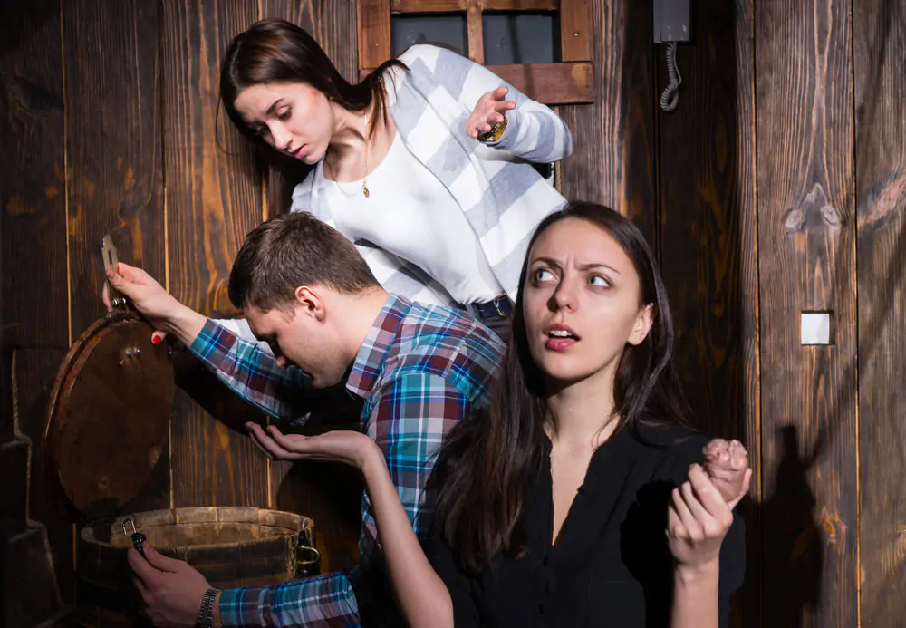 man and woman looking in a barrel